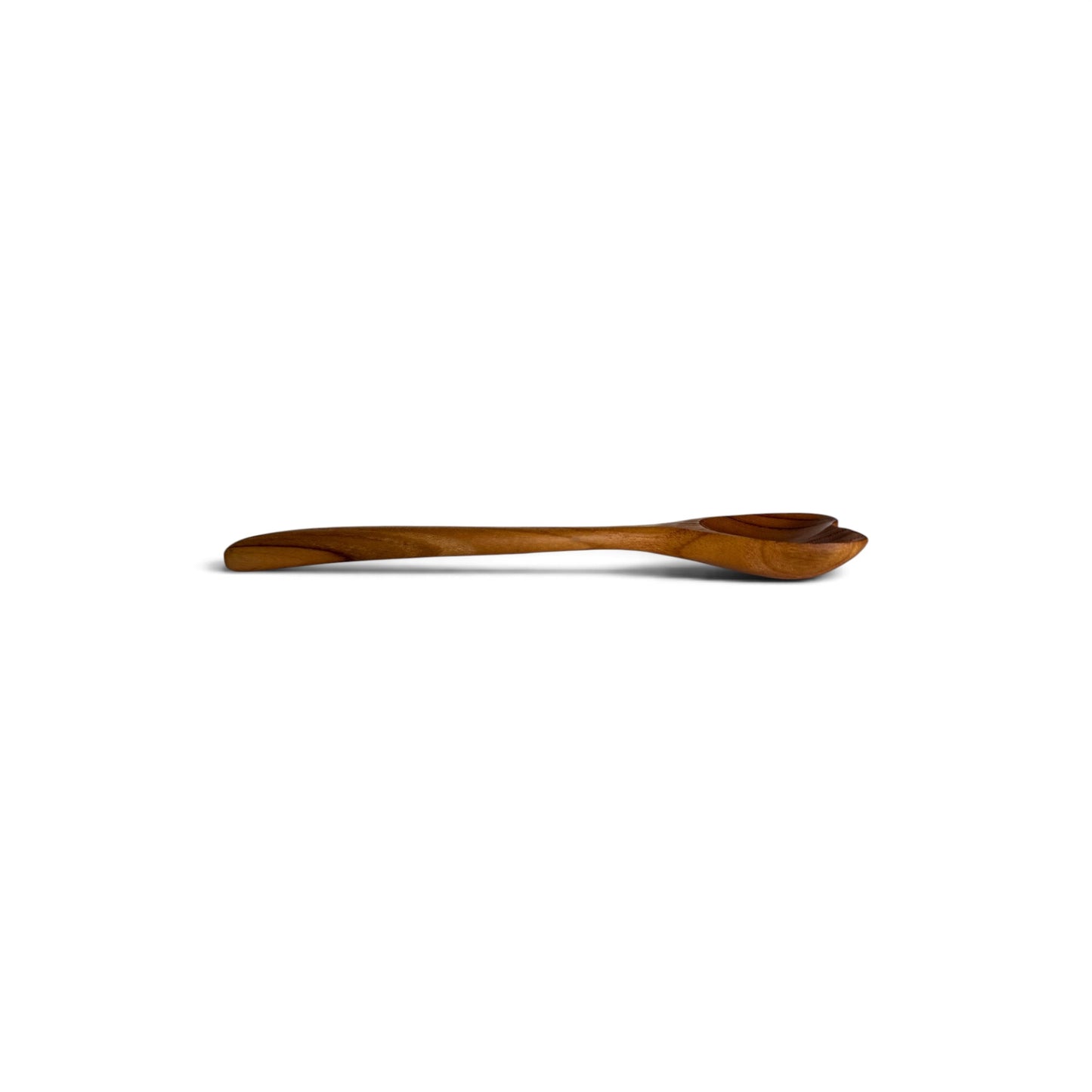 Side profile view of an 18cm heart teak spoon displaying its slender handle.