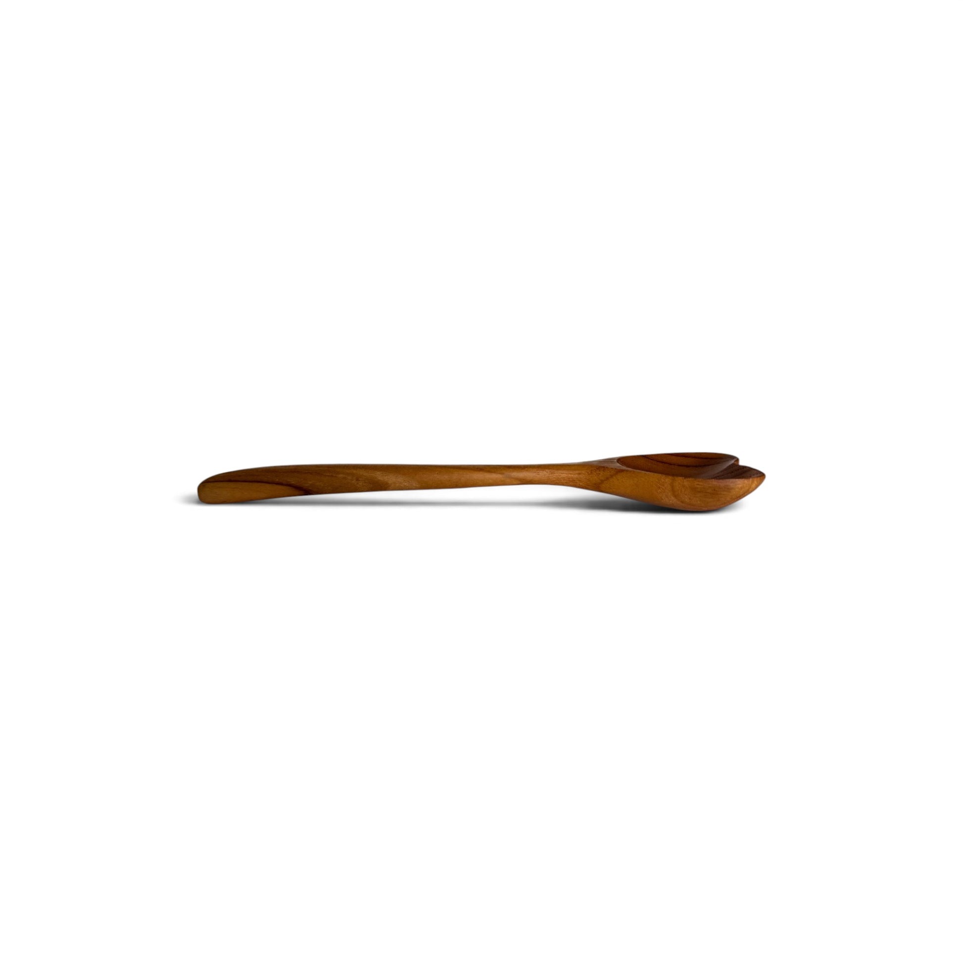 Side profile view of an 18cm heart teak spoon displaying its slender handle.