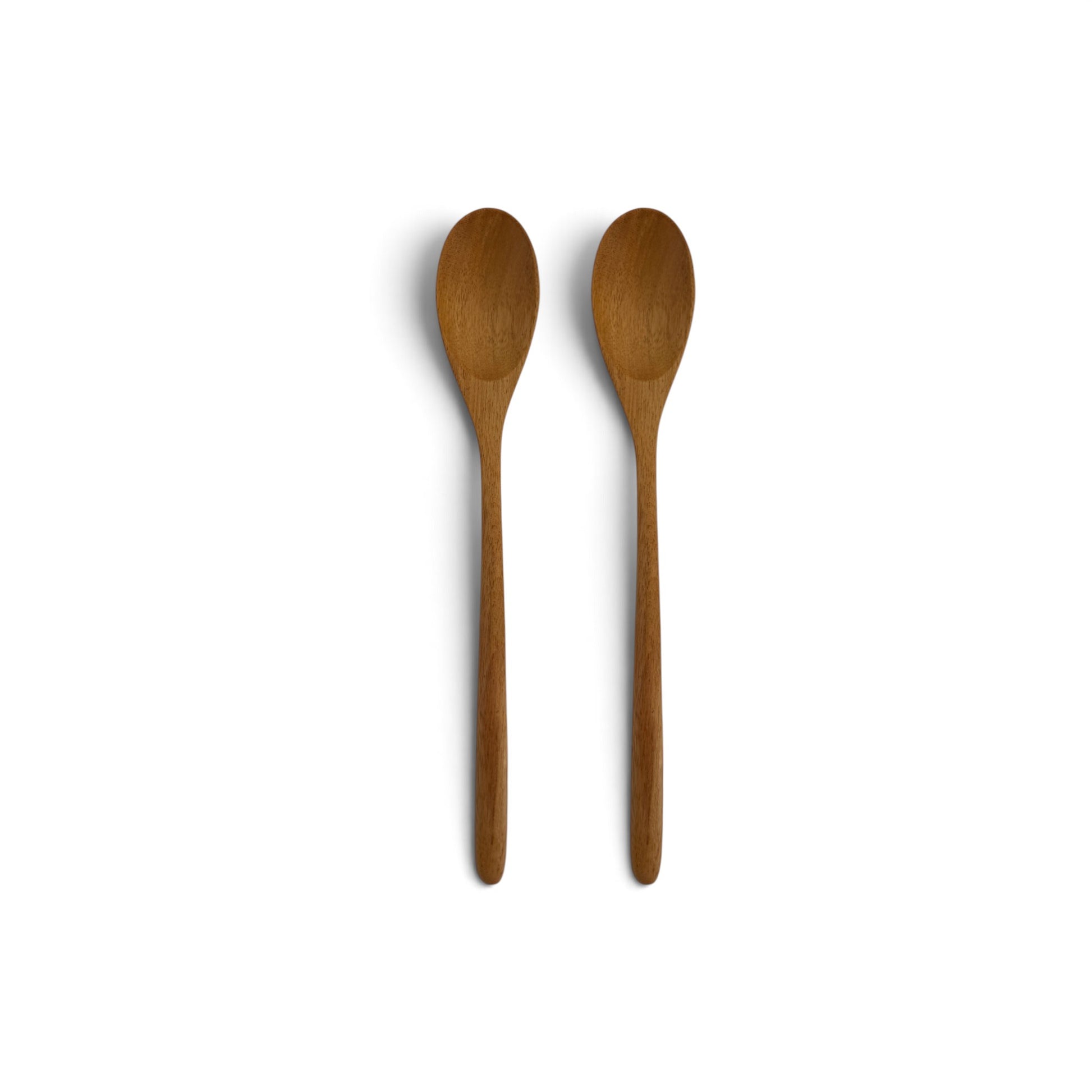 Pair of hand-carved teak wood spoons side-by-side on a clean white background.