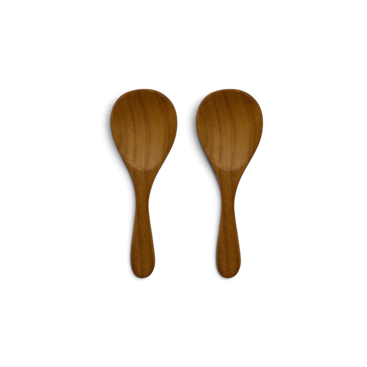 Pair of hand-carved broad teak spoons with wide bowls side-by-side on a white background.