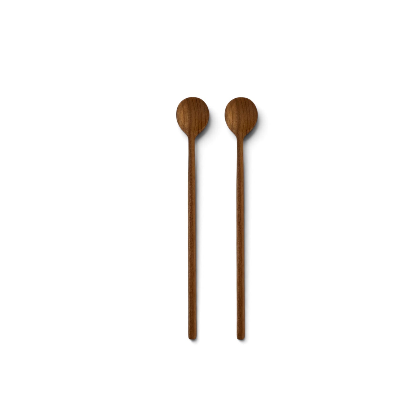 Pair of long, slender teak wood stirring spoons side-by-side on a white background.
