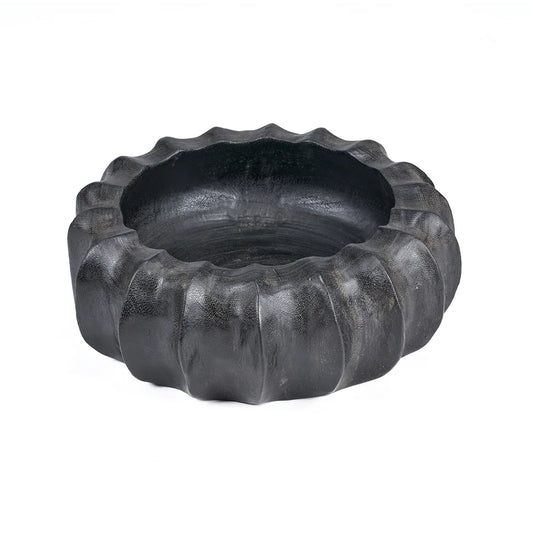 Large, heavy hand-carved mango wood bowl with a deep black finish and sculptural texture.