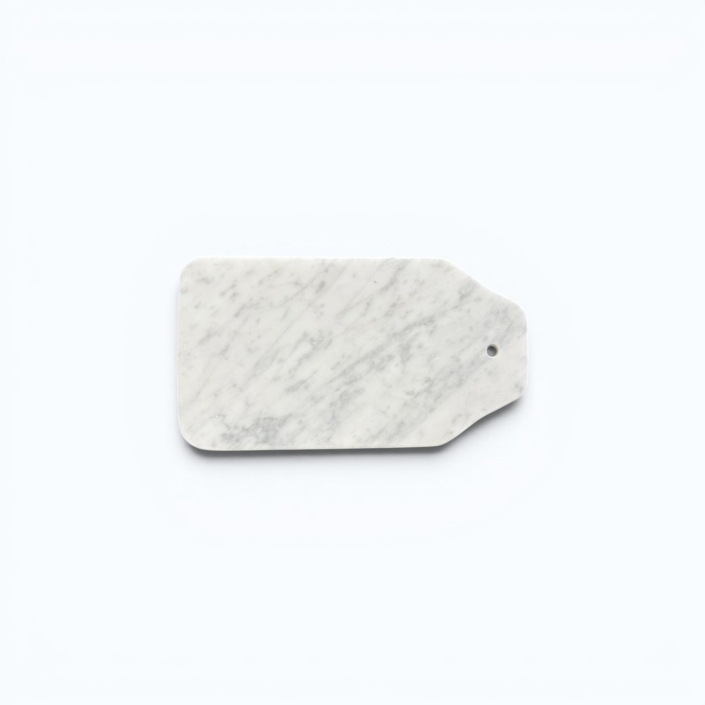 white Carrara marble cheese board with grey veining.