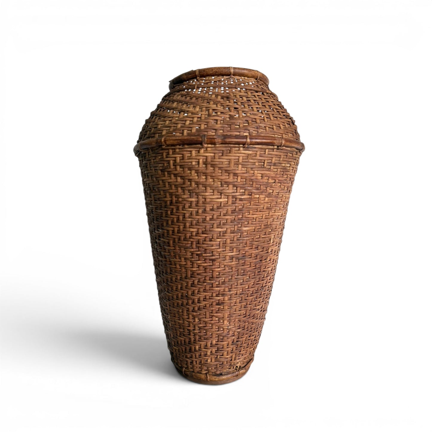 Tall tapered hand-woven natural bamboo floor vessel with a fine structural weave pattern